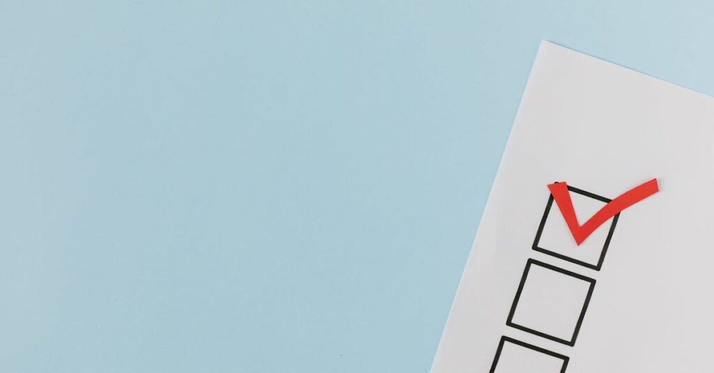 A checklist with a red checkmark symbolizing a completed task on a pastel blue background.